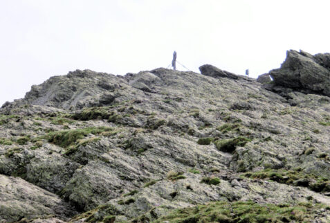 Close to the top of Pizzo dei Tre Signori with its cross