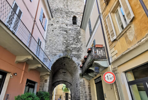 Varzi - The clock tower with the gate of the medieval part of the village