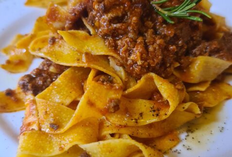 Homemade tagliatelle with ragù - Osteria del Conte