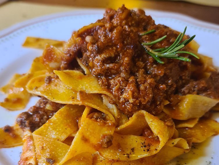 spaghetti with white ragù and pecorino cheese