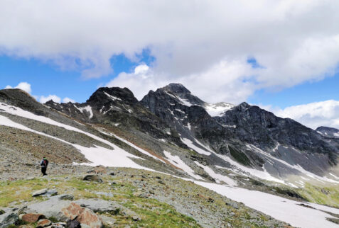 Val Loga- Pizzo dei Zocconi (3092 meters - left and flat) and Piz Tambò (3279 meters right)