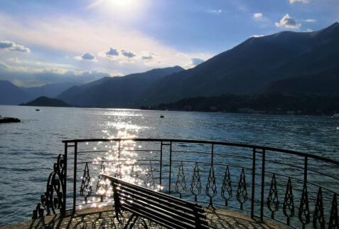 Bellagio – shimmering sun on the lake facing the village seen from a bench in a fantastic position – BBofItaly