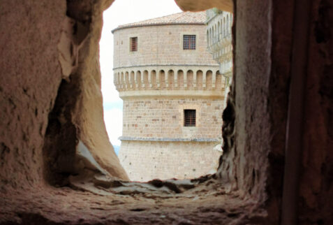 Fortezza di San Leo – a tower seen through a fire mouth – BBofItaly