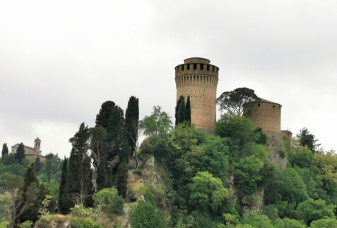 Brisighella – Rocca Manfrediana. On the background, left side, there is the Santuario Madonna del Monticino – BBofItaly